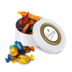 Overflowing small white quality street selection tin