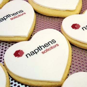 Branded heart shaped biscuits with printed icing