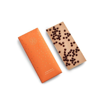 a white chocolate bar with gingerbread pearls